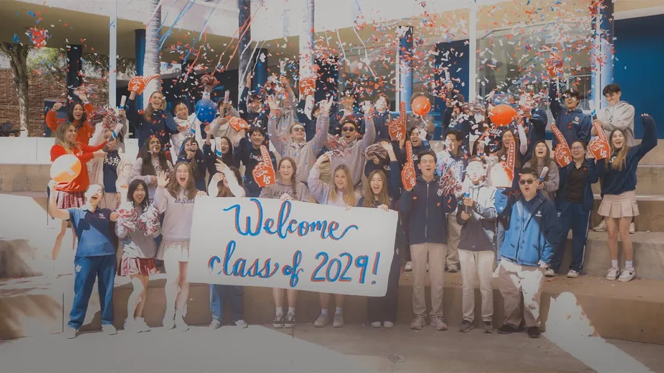 La Salle students cheering under confetti with a Welcome Class of 2029 sign.
